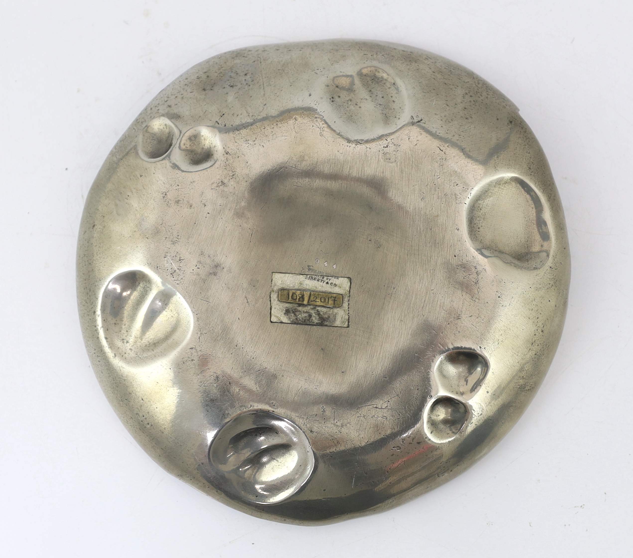 Archibald Knox for Liberty & Co., The Bollellin Shield, circa 1903, English pewter dish 26cm diameter